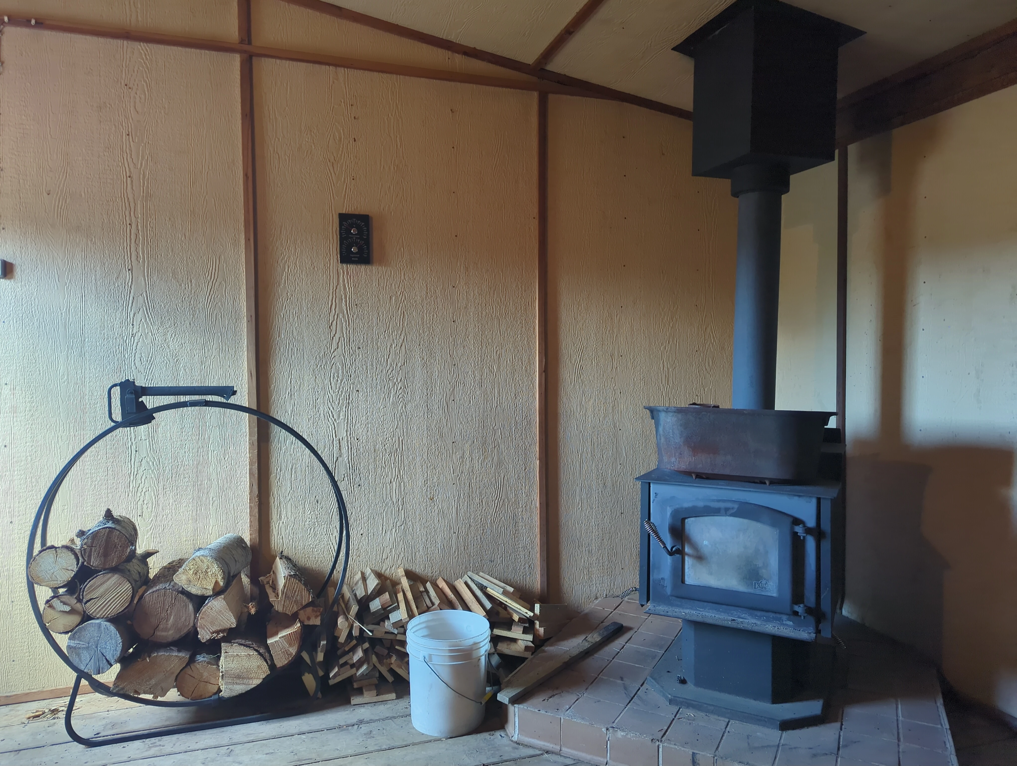 Wood-fired stove inside the onsite sauna